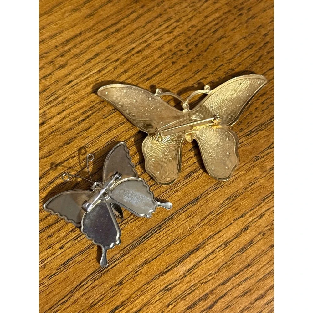 Butterfly broaches